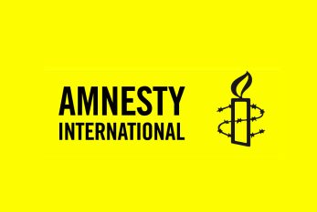 El emblema de Amnistía Internacional.