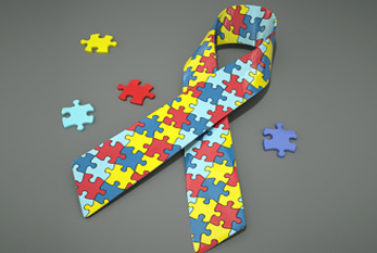 La cinta de Concienciación sobre el Autismo de color - El patrón de puzzle refleja el misterio y la complejidad del espectro autista.
